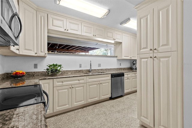 kitchen with appliances with stainless steel finishes and a sink