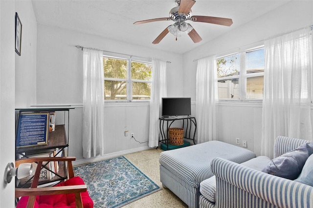 bedroom featuring ceiling fan and speckled floor