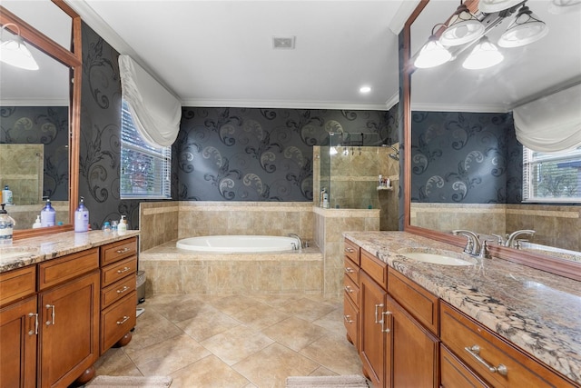 full bath with wallpapered walls, ornamental molding, two vanities, a sink, and a bath