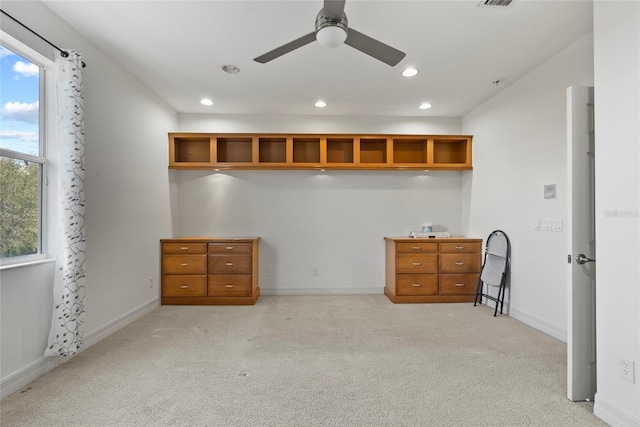 office space with light carpet, plenty of natural light, baseboards, and recessed lighting