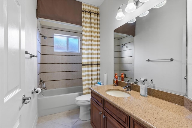 bathroom featuring shower / tub combo, tile patterned flooring, vanity, and toilet