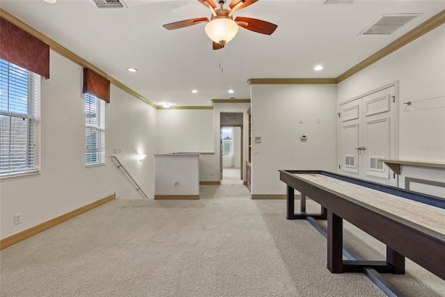 playroom with recessed lighting, visible vents, ornamental molding, light carpet, and baseboards