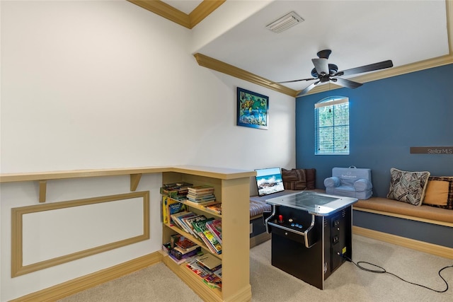 playroom featuring a ceiling fan, baseboards, visible vents, carpet, and crown molding