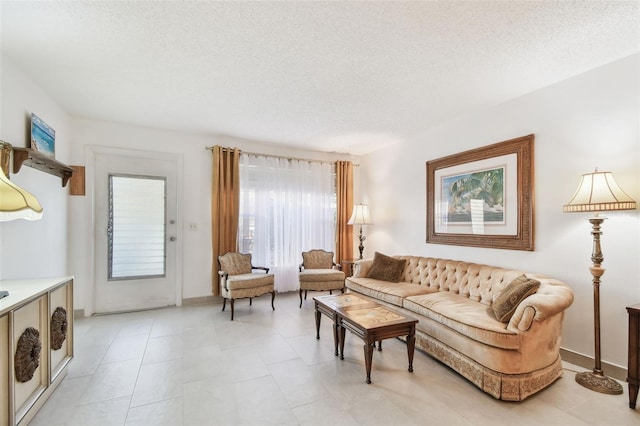 living room with a textured ceiling