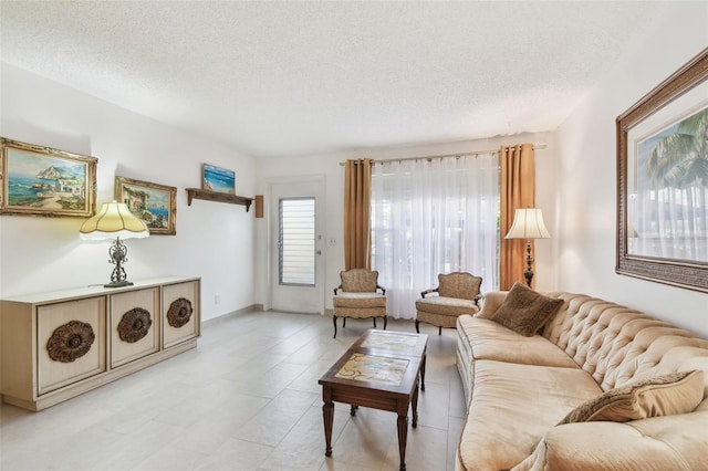 living room with a textured ceiling