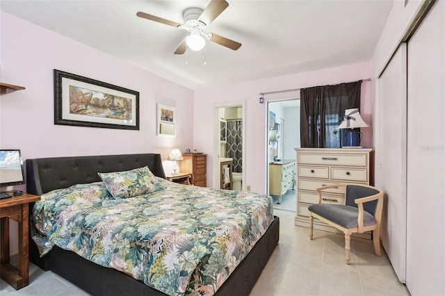 bedroom with light tile patterned floors, ceiling fan, and a closet