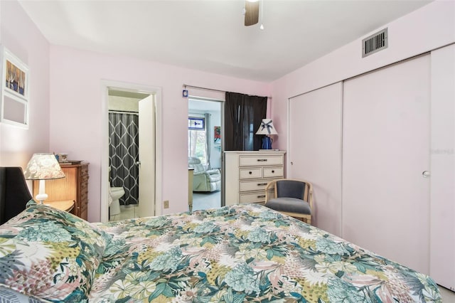 bedroom with a ceiling fan, a closet, visible vents, and connected bathroom