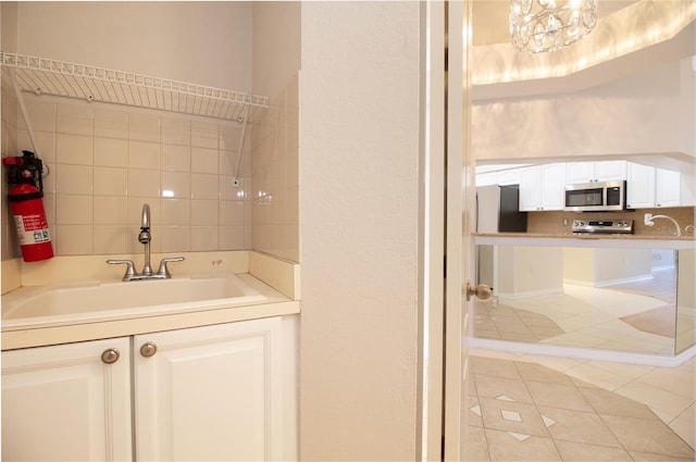 bathroom featuring vanity and tile patterned floors