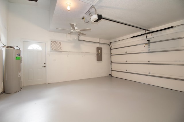 garage featuring water heater, electric panel, and a garage door opener