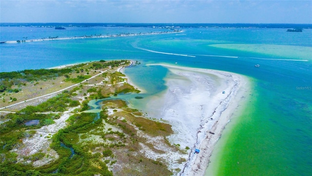 aerial view featuring a view of the beach and a water view