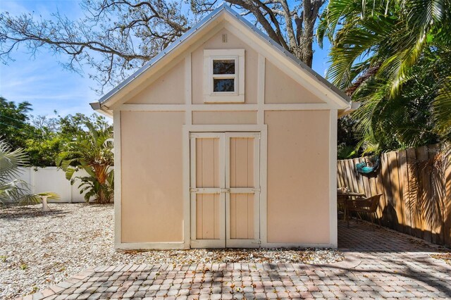 view of shed featuring a fenced backyard