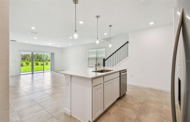 10356 Cross River Trl, Parrish, FL 34219 - kitchen with a sink, dishwasher, open floor plan, recessed lighting, and light countertops