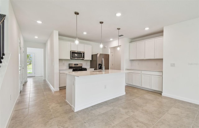 10356 Cross River Trl, Parrish, FL 34219 - kitchen with stainless steel appliances, decorative backsplash, recessed lighting, and white cabinets