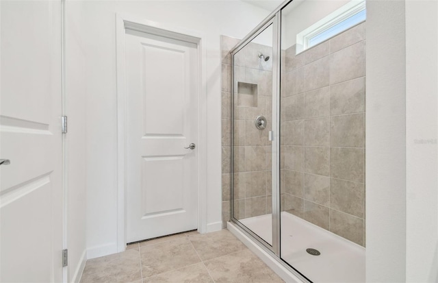 10356 Cross River Trl, Parrish, FL 34219 - full bath featuring a shower stall and tile patterned flooring