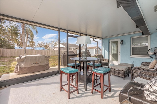 sunroom featuring visible vents