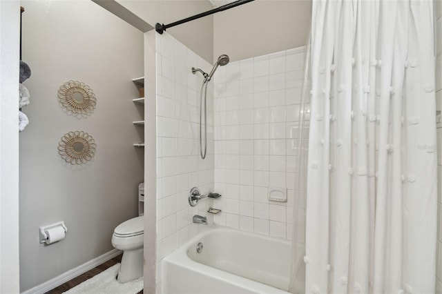 bathroom featuring shower / tub combo with curtain, toilet, and hardwood / wood-style floors