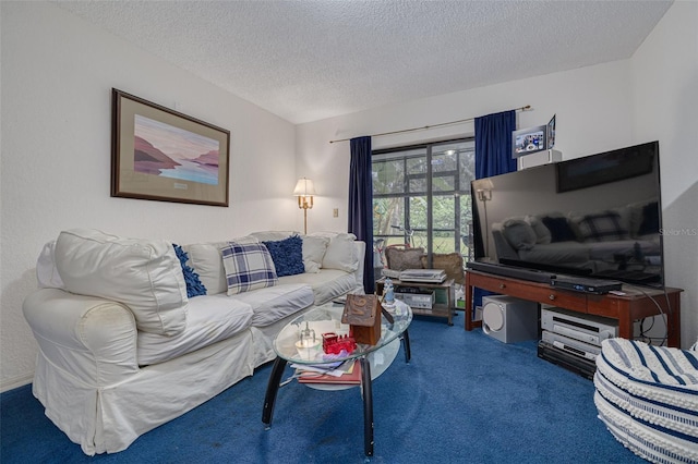 living room featuring carpet flooring and a textured ceiling