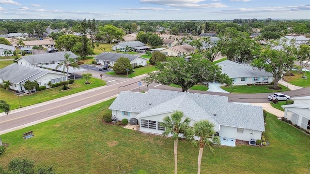 2301 Grenoble Pl Unit 1, Sun City Center, FL 33573 - drone / aerial view featuring a residential view
