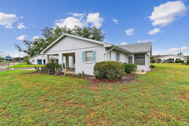 2301 Grenoble Pl Unit 1, Sun City Center, FL 33573 - bungalow-style house featuring stucco siding and a front lawn