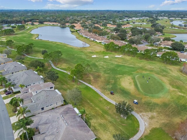 2301 Grenoble Pl Unit 1, Sun City Center, FL 33573 - drone / aerial view with a water view, a residential view, and view of golf course