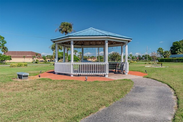 2301 Grenoble Pl Unit 1, Sun City Center, FL 33573 - view of property's community featuring a gazebo and a lawn