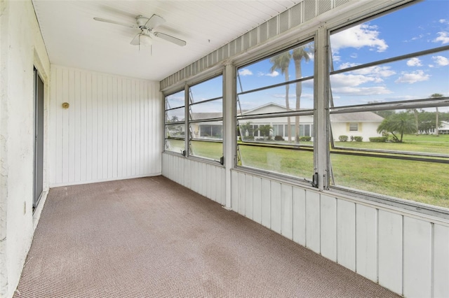 2301 Grenoble Pl Unit 1, Sun City Center, FL 33573 - unfurnished sunroom featuring ceiling fan