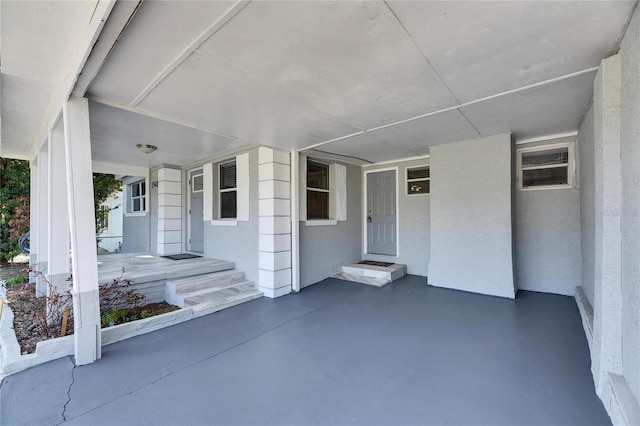 view of patio with a wall mounted AC