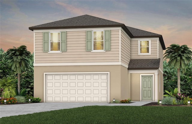 view of front of property with driveway, a shingled roof, an attached garage, and stucco siding