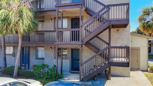 view of property with stairway