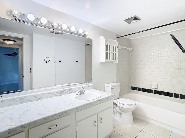 6312 Newtown Cir Unit 12A5, Tampa, FL 33615 - bathroom with visible vents, toilet, tile patterned floors, vanity, and shower / bathing tub combination