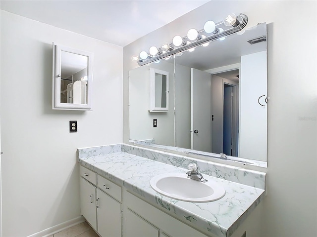 6312 Newtown Cir Unit 12A5, Tampa, FL 33615 - bathroom featuring visible vents, vanity, and baseboards