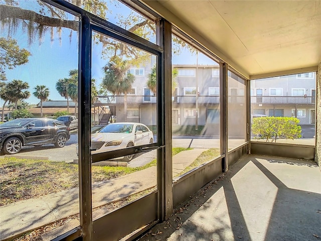 6312 Newtown Cir Unit 12A5, Tampa, FL 33615 - sunroom with lofted ceiling