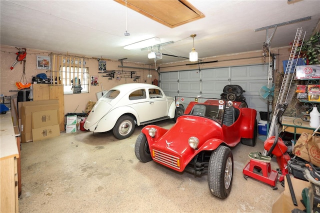 garage featuring a garage door opener