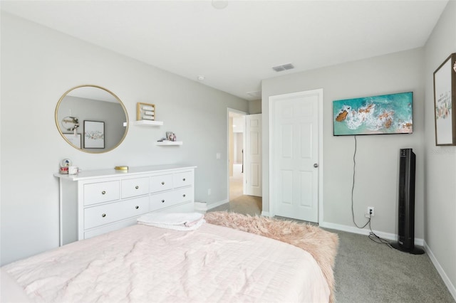 bedroom featuring light carpet, visible vents, and baseboards