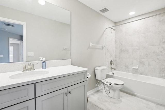 full bathroom with shower / bathtub combination, visible vents, vanity, and toilet