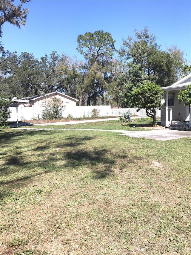 view of yard with fence