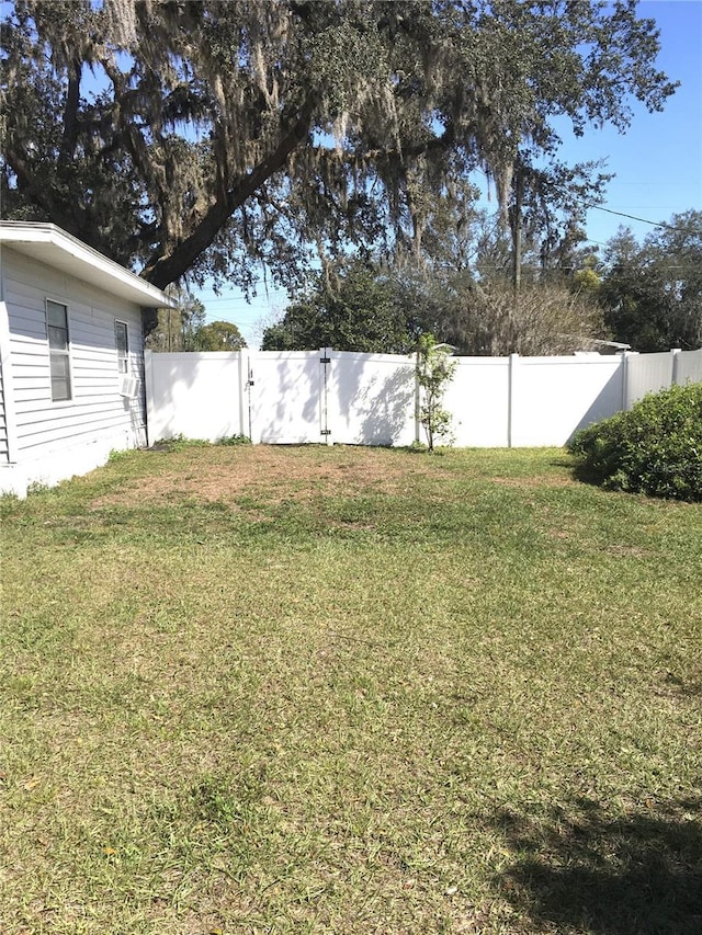 view of yard with fence