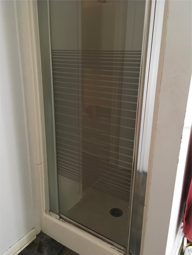 bathroom with a stall shower