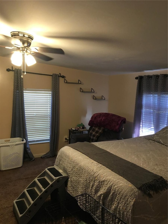 carpeted bedroom featuring a ceiling fan