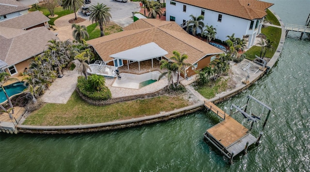 aerial view with a water view and a residential view