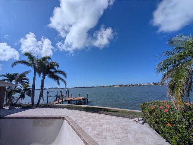 view of dock featuring a water view and boat lift