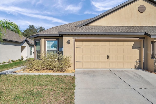 ranch-style home with a garage