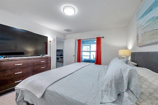 bedroom with a textured ceiling