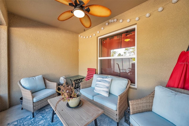 view of patio / terrace with an outdoor living space and ceiling fan