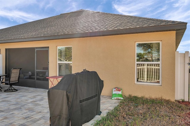 back of property featuring a patio area