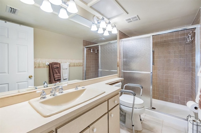 full bath with toilet, vanity, visible vents, and tile patterned floors