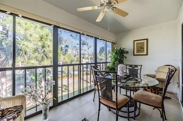 sunroom with a ceiling fan