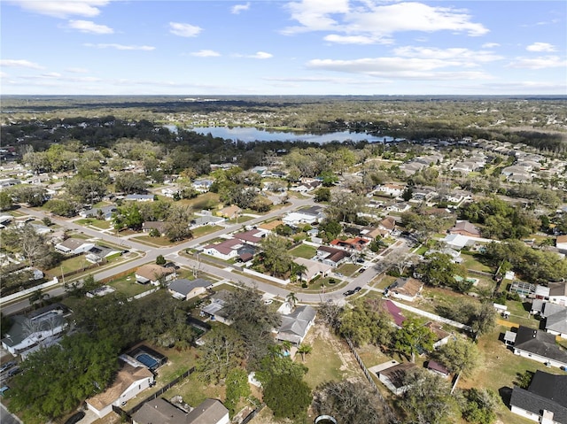 bird's eye view featuring a residential view and a water view