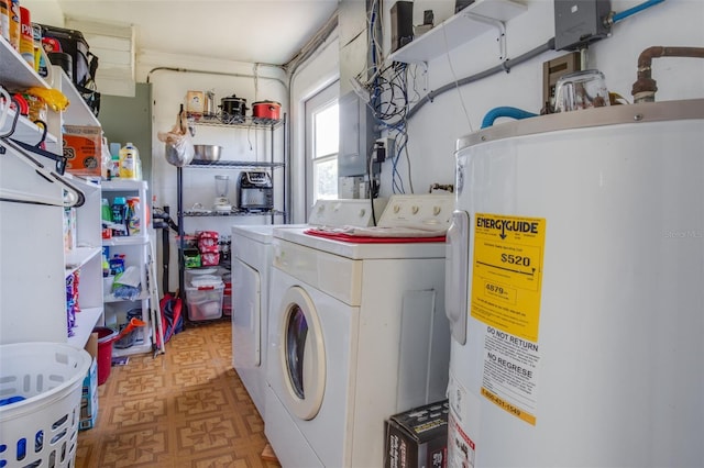 clothes washing area with laundry area, electric panel, light floors, washing machine and dryer, and water heater