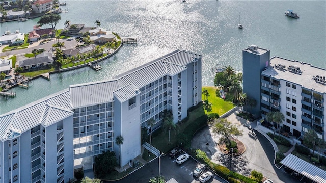 birds eye view of property featuring a water view